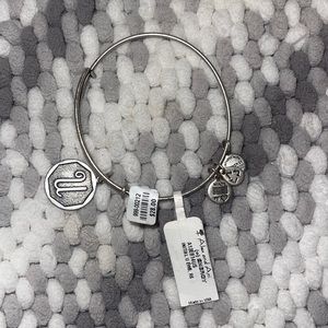 Free with any purchase 10$ or more Alex and Ani initial bracelet. Silver  “U”